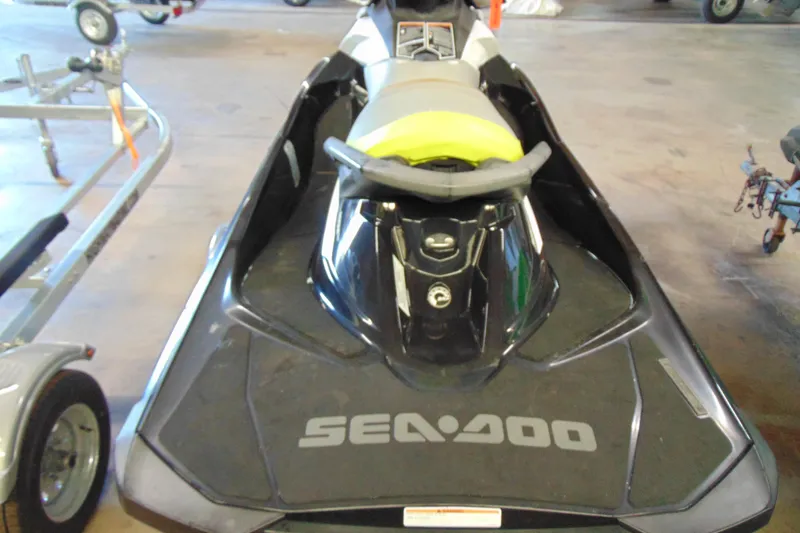 Slide: The Image of 2016 Sea-Doo GTI SE 130 jet ski in a garage setting. - 8