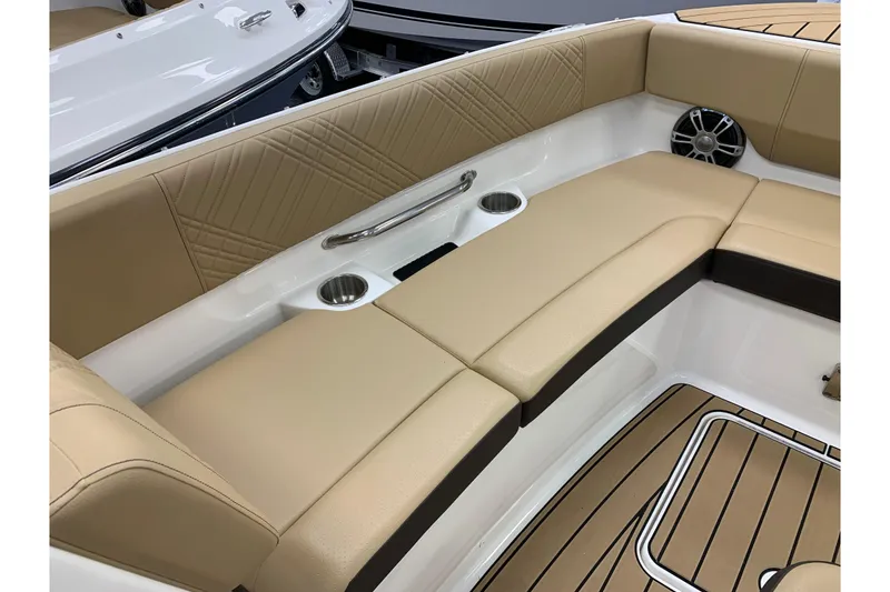 Slide: The Image of Luxurious seating area on 2025 Sea Ray SDX 270 boat with tan upholstery. - 19