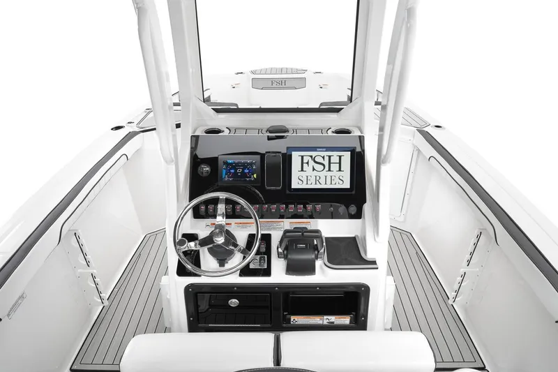 Slide: The Image of 2026 Yamaha Boats 252 FSH Sport dashboard with steering wheel and control panel. - 3