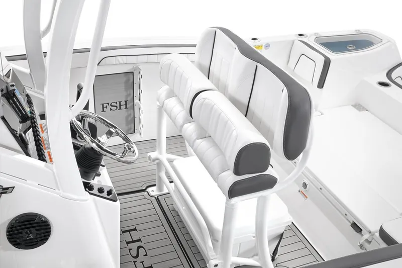 Slide: The Image of 2026 Yamaha Boats 252 FSH Sport interior with sleek seating and modern steering console. - 6