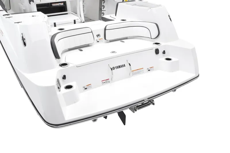 Slide: The Image of 2026 Yamaha Boats 252 FSH Sport, white rear view, featuring seating and cup holders. - 9