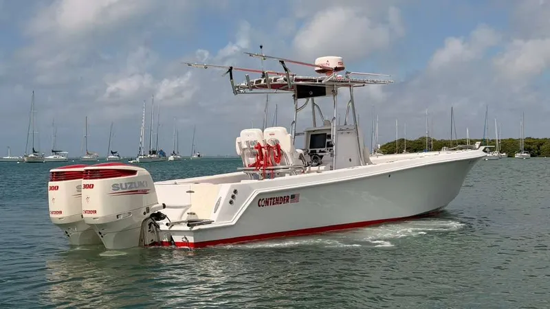 The Image of Contender 27 Tournament boat from 2001 on calm waters. - 0