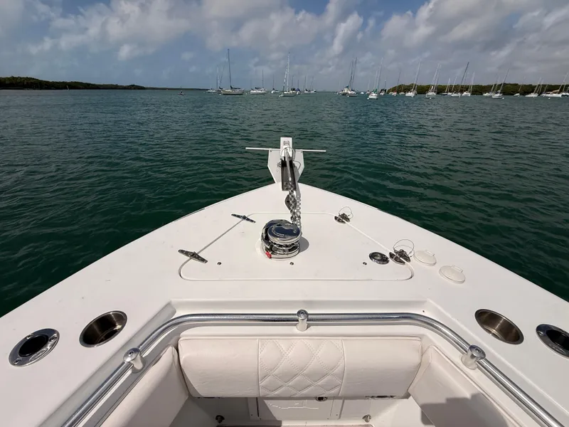 Slide: The Image of Contender 27 Tournament boat on calm waters, year 2001. - 13