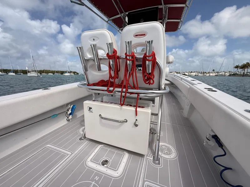 Slide: The Image of Contender 27 Tournament boat, 2001, with red ropes and gray deck. - 18