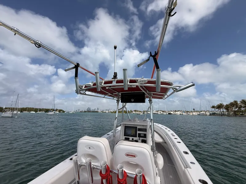 Slide: The Image of Contender 27 Tournament boat on calm waters, 2001 model. - 22
