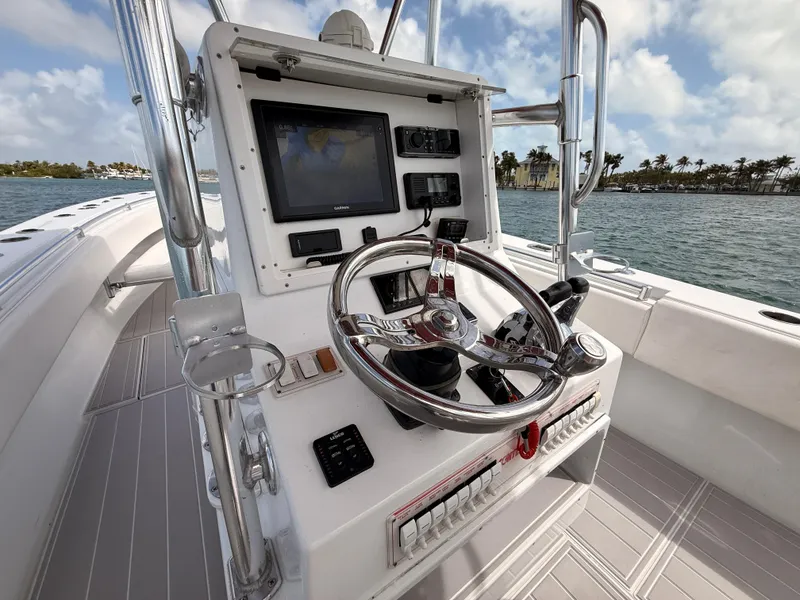 Slide: The Image of Helm console of a 2001 Contender 27 Tournament boat. - 25