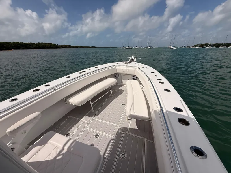 Slide: The Image of Contender 27 Tournament boat on calm waters, 2001 model. - 8