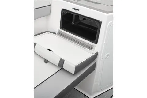 Slide: The Image of 2026 Yamaha Boats AR220 interior storage compartment with sleek design and modern features. - 6