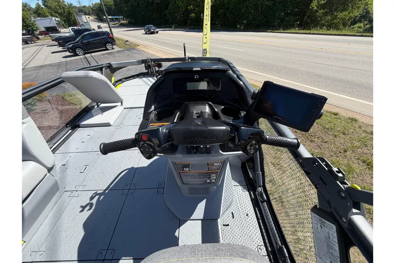Slide: The Image of 2024 Sea-Doo Switch Sport 21 dashboard with steering and navigation display. - 5