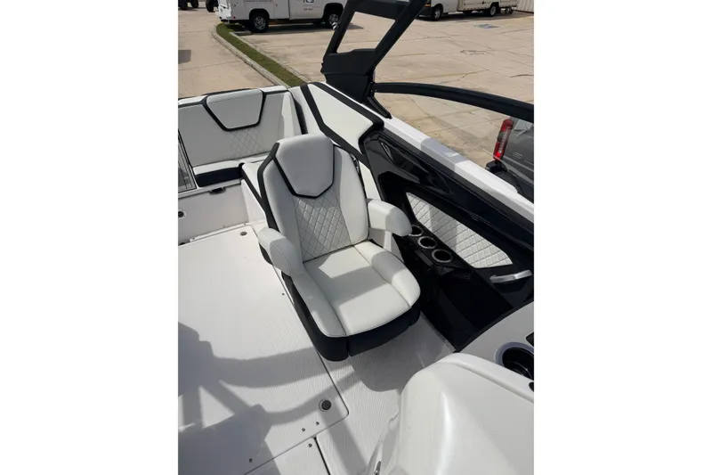 Slide: The Image of 2026 Yamaha Boats 252S interior with white seating and modern design. - 15
