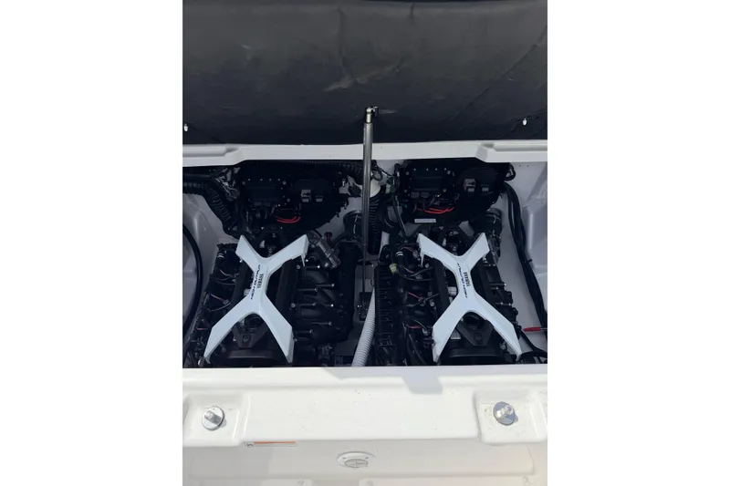 Slide: The Image of Engine compartment of 2026 Yamaha Boats 252S, showcasing dual engines and components. - 22