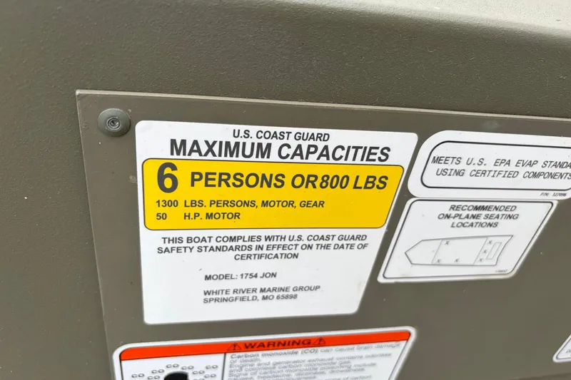 Slide: The Image of 2024 TRACKER MARINE Grizzly 1754 capacity label, 6 persons or 800 lbs, 50 HP motor. - 10
