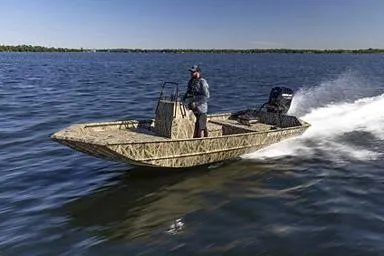 Slide: The Image of Manufacturer Provided Image: 2026 Crestliner 1870 Retriever FCC boat speeding on open water, with driver standing. - 2