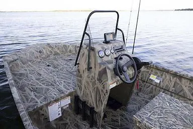 Slide: The Image of Manufacturer Provided Image: 2026 Crestliner 1870 Retriever FCC boat with camo design on a calm lake. - 6