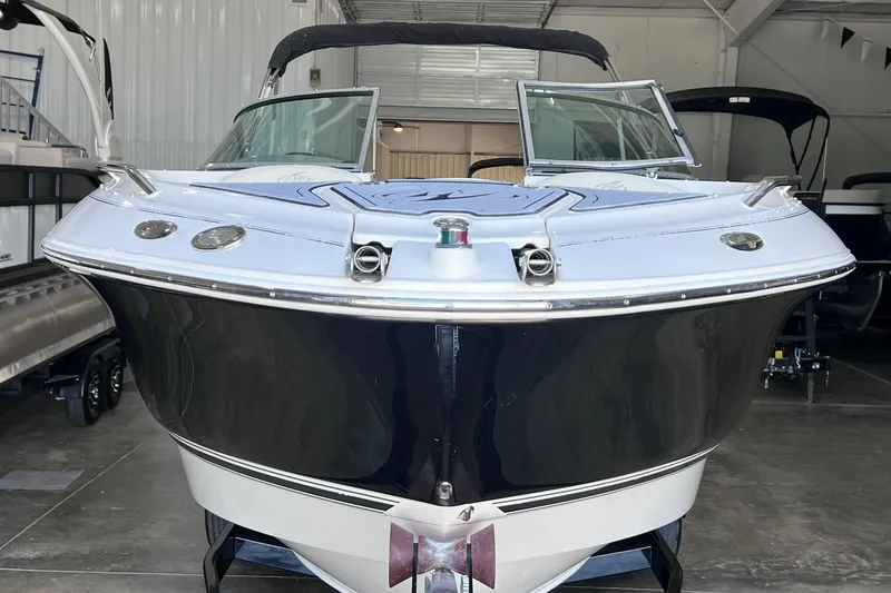 Slide: The Image of 2007 Monterey 248LS Montura Bowrider in a showroom, front view. - 2