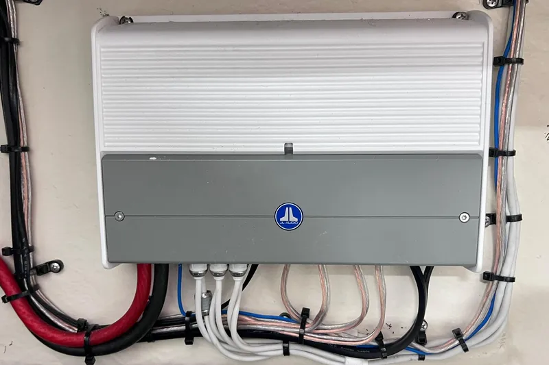 Slide: The Image of JL Audio amplifier with wiring in a 2007 Monterey 248LS Montura Bowrider boat. - 41