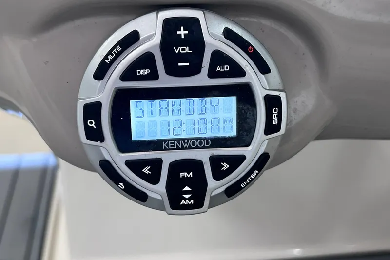 Slide: The Image of Kenwood stereo system on 2007 Monterey 248LS Montura Bowrider boat dashboard. - 42