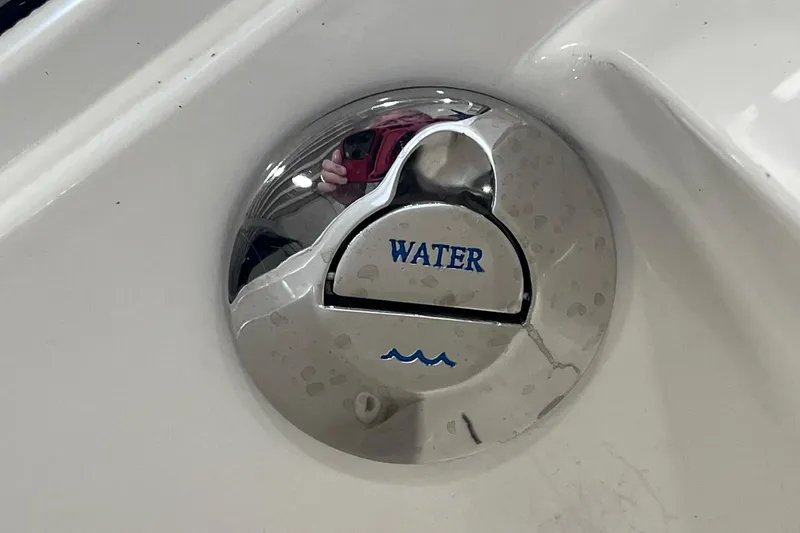 Slide: The Image of Chrome water cap on 2007 Monterey 248LS Montura Bowrider boat. - 44