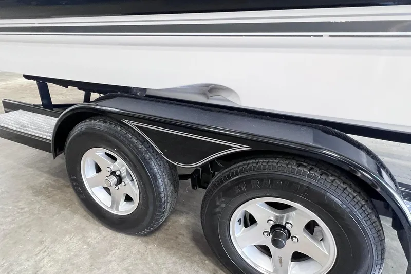 Slide: The Image of Trailer wheels of a 2007 Monterey 248LS Montura Bowrider boat. - 48