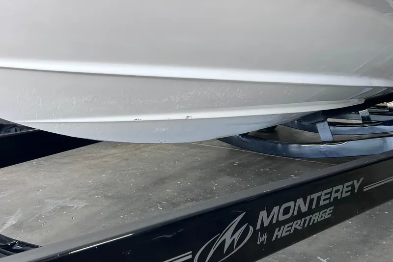 Slide: The Image of 2007 Monterey 248LS Montura Bowrider on trailer, close-up view of hull. - 50