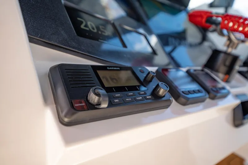 Slide: The Image of Control panel of MVI Invicta 30OC 2026 boat featuring Garmin marine electronics. - 18