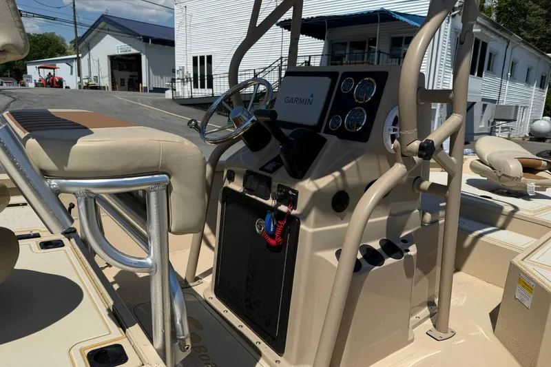 Slide: The Image of 2022 G3 Bay 18 GX boat console with Garmin navigation system and seating. - 10