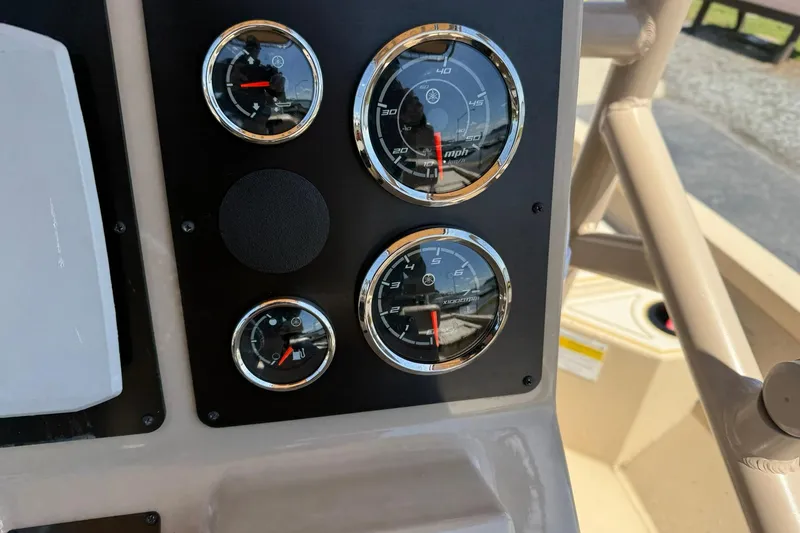 Slide: The Image of Dashboard of 2022 G3 Bay 18 GX boat with gauges and controls. - 12