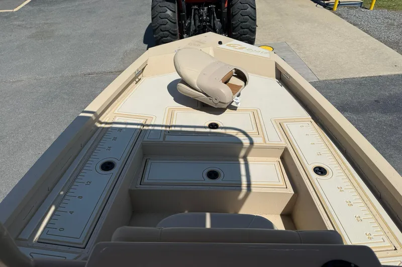 Slide: The Image of 2022 G3 Bay 18 GX boat interior with measuring rulers and seating. - 13