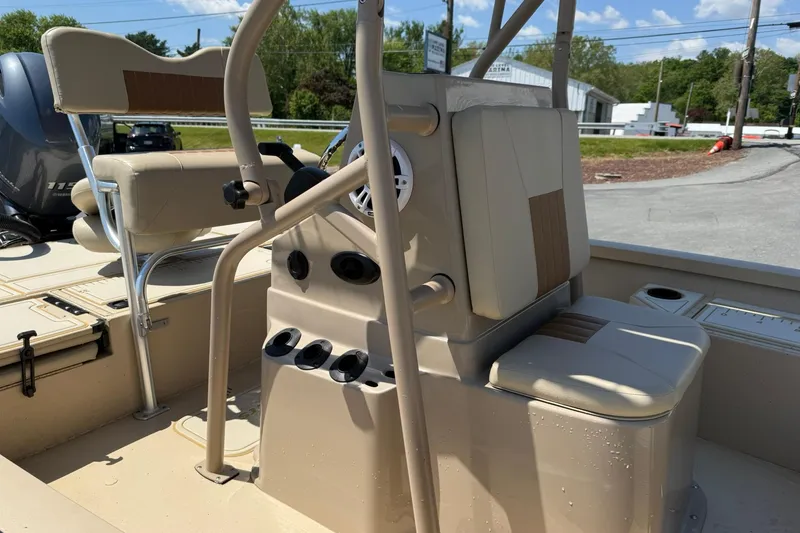 Slide: The Image of 2022 G3 Bay 18 GX boat interior with seating and console details. - 9