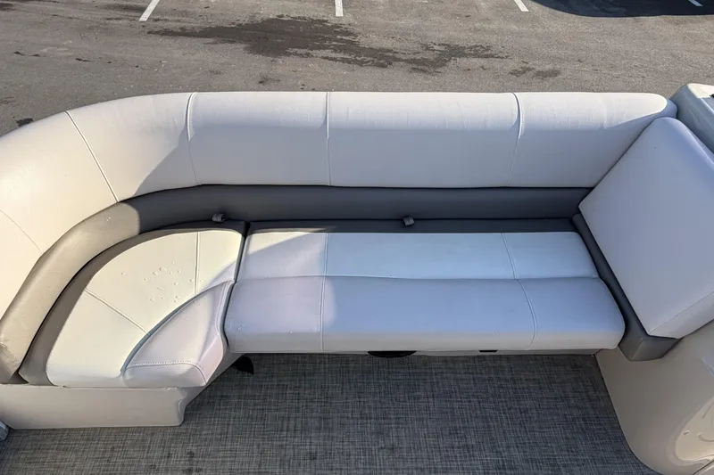 Slide: The Image of 2019 SunCatcher V322 Cruise boat seating with light gray upholstery and spacious design. - 13