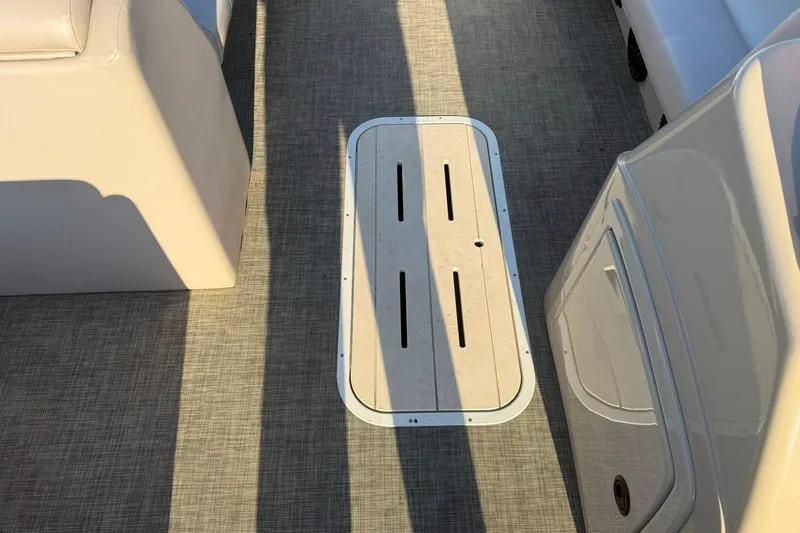 Slide: The Image of Floor view of 2019 SunCatcher V322 Cruise boat interior with storage hatch. - 26