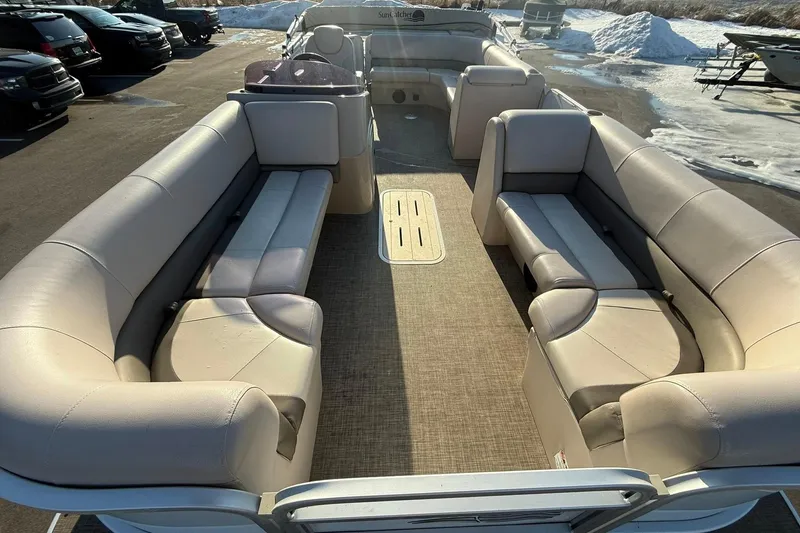 Slide: The Image of 2019 SunCatcher V322 Cruise pontoon boat with spacious seating and beige upholstery. - 7