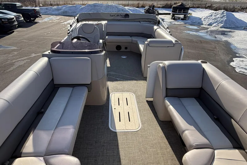 Slide: The Image of 2019 SunCatcher V322 Cruise pontoon boat with spacious seating and modern design. - 8