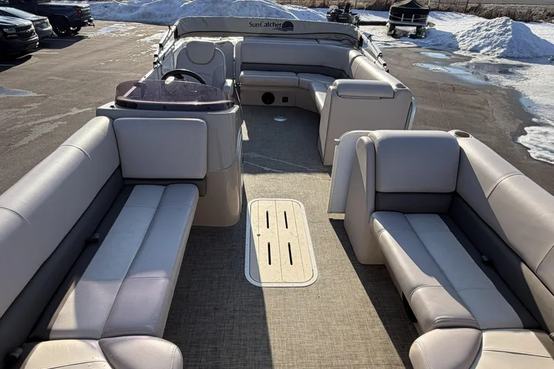 Slide: The Image of 2019 SunCatcher V322 Cruise pontoon boat with spacious seating and modern design. - 9