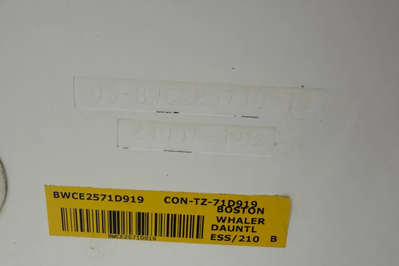 Slide: The Image of 2019 Boston Whaler 210 Dauntless hull identification number and label. - 13