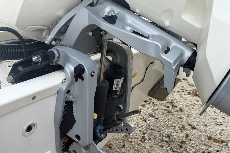 Slide: The Image of Close-up of 2019 Boston Whaler 210 Dauntless boat engine mount and hydraulic system. - 14