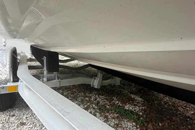 Slide: The Image of 2019 Boston Whaler 210 Dauntless boat on trailer, underside view. - 18