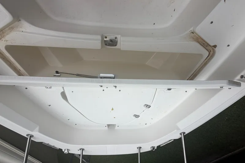 Slide: The Image of Open storage compartment on a 2019 Boston Whaler 210 Dauntless boat. - 23