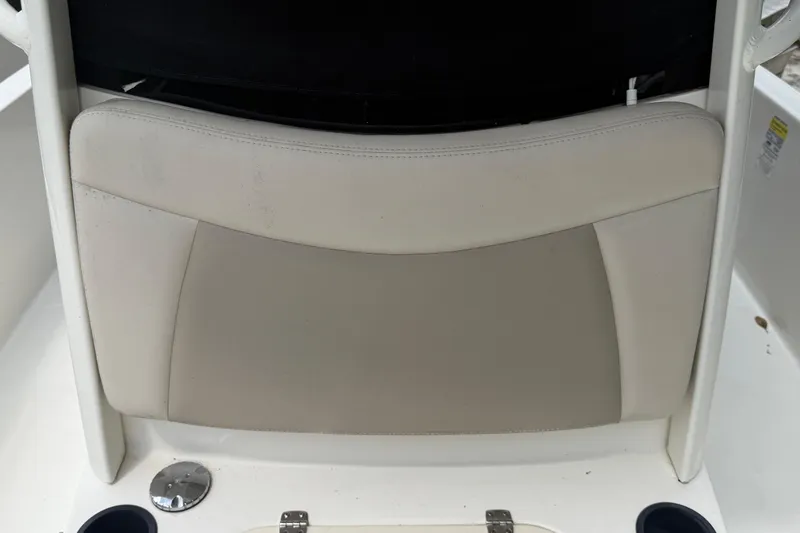 Slide: The Image of Boston Whaler 210 Dauntless 2019 boat seat with cup holders and stainless steel fittings. - 26