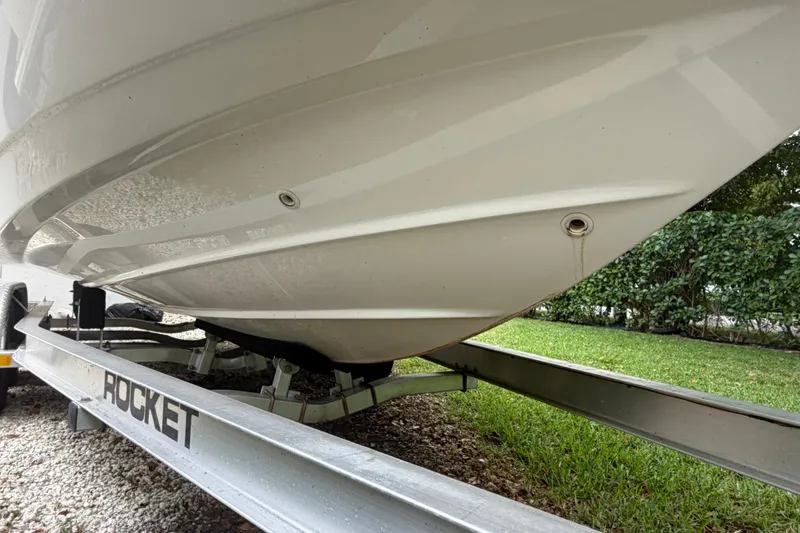 Slide: The Image of 2019 Boston Whaler 210 Dauntless boat on a Rocket trailer, side view. - 8