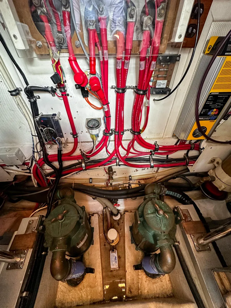 Slide: The Image of Engine room of a 2000 Grand Banks Eastbay 43 Ex with wiring and machinery. - 43