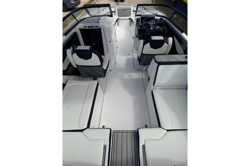 Slide: The Image of Interior view of 2026 Yamaha Boats 252SD, featuring sleek seating and modern design. - 12