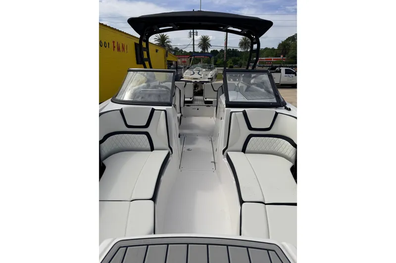Slide: The Image of 2026 Yamaha Boats 252SD interior with sleek seating and modern design. - 7