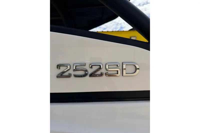 Slide: The Image of 2026 Yamaha Boats 252SD emblem on a sleek white surface. - 8