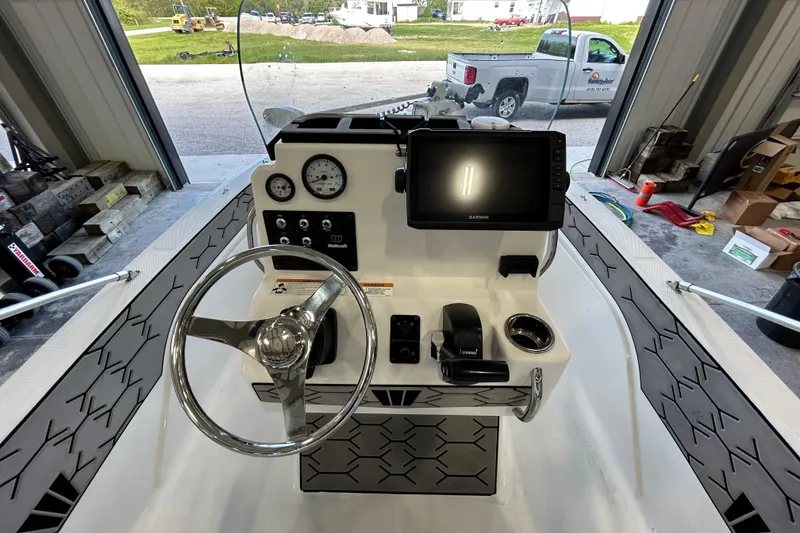Slide: The Image of 2020 Wellcraft 162 Fisherman boat console with steering wheel and navigation display. - 6