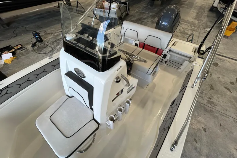 Slide: The Image of 2020 Wellcraft 162 Fisherman boat interior with steering console and seating. - 8