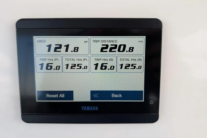Slide: The Image of Digital display showing fuel usage and trip data for 2023 Key West 263 FS boat. - 14