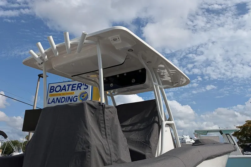 Slide: The Image of 2023 Key West 263 FS boat at Boater's Landing under a partly cloudy sky. - 23