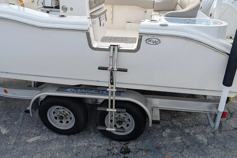Slide: The Image of 2023 Key West 263 FS boat on trailer with ladder, side view. - 6