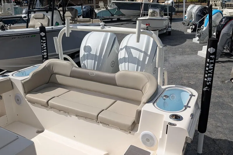 Slide: The Image of 2023 Key West 263 FS boat interior with seating and storage compartments. - 7